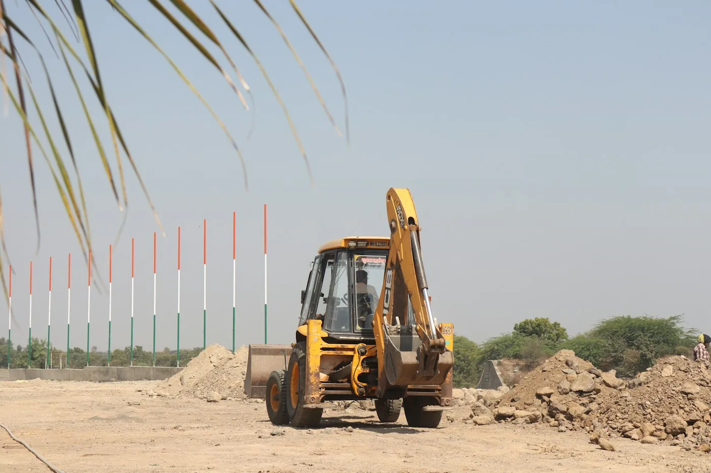 Excavator on a cleared dirt site